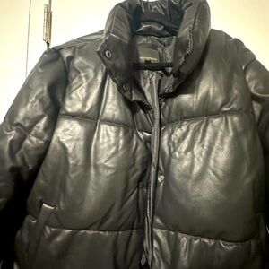 Pleather puffer with mock neck and snap buttons